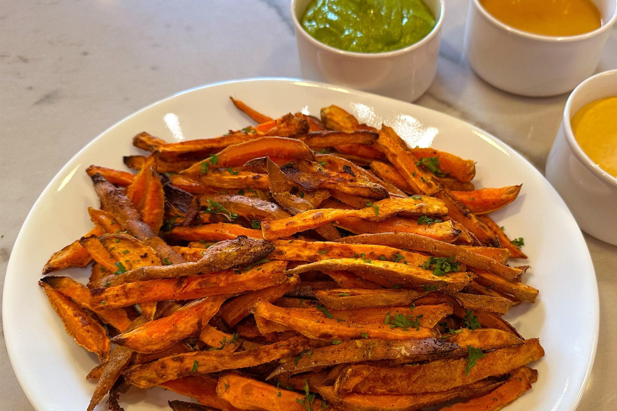 Oven-baked sweet potato fries and three delicious dips