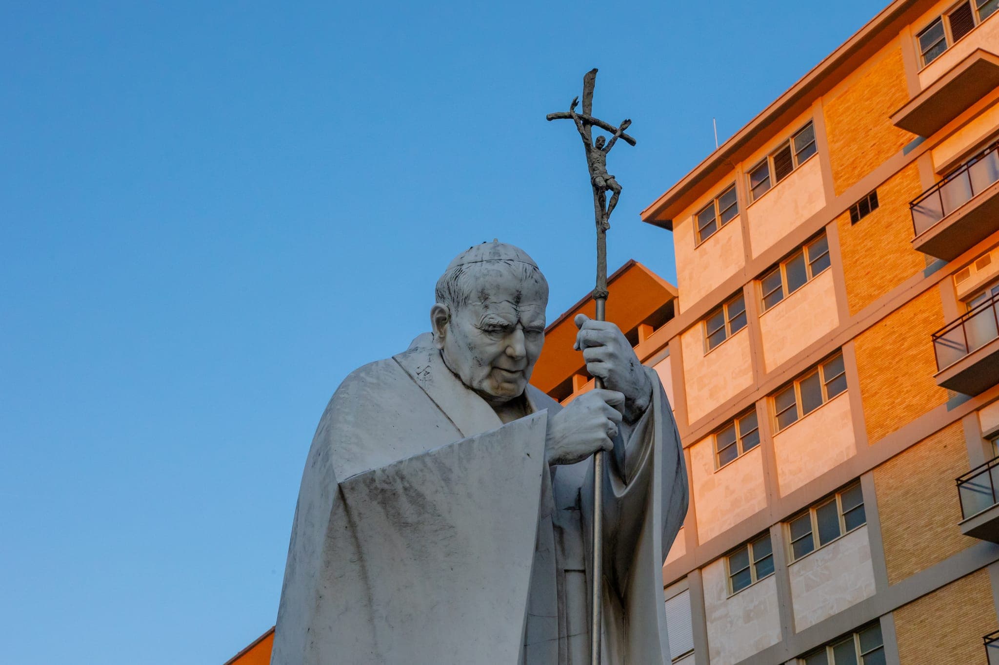 Pope Leo walks, concelebrates Mass at hospital as he recovers from surgery