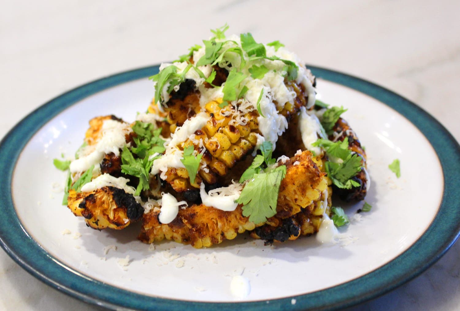 Caramelized Corn Ribs with Lime Crema