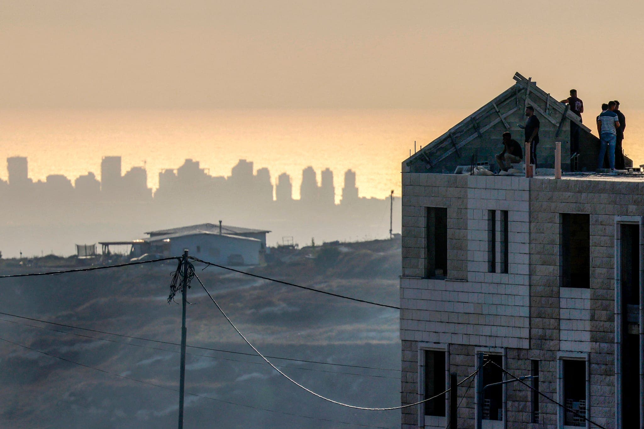 Settlers seize Palestinian home as Israeli forces close roads across West Bank