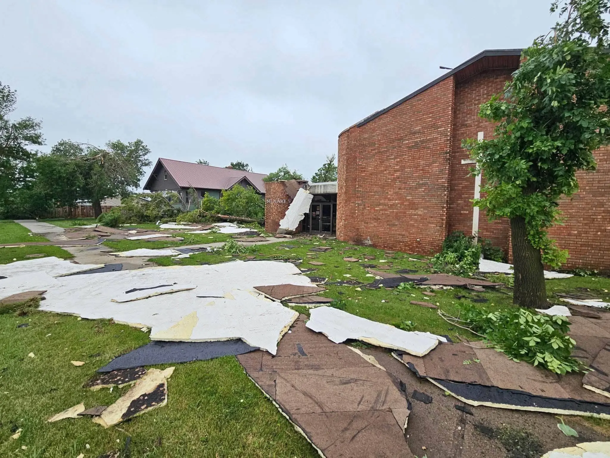 EXCLUSIVE | South Dakota priest reflects on hope after sunlight illuminates crucifix through storm-split roof